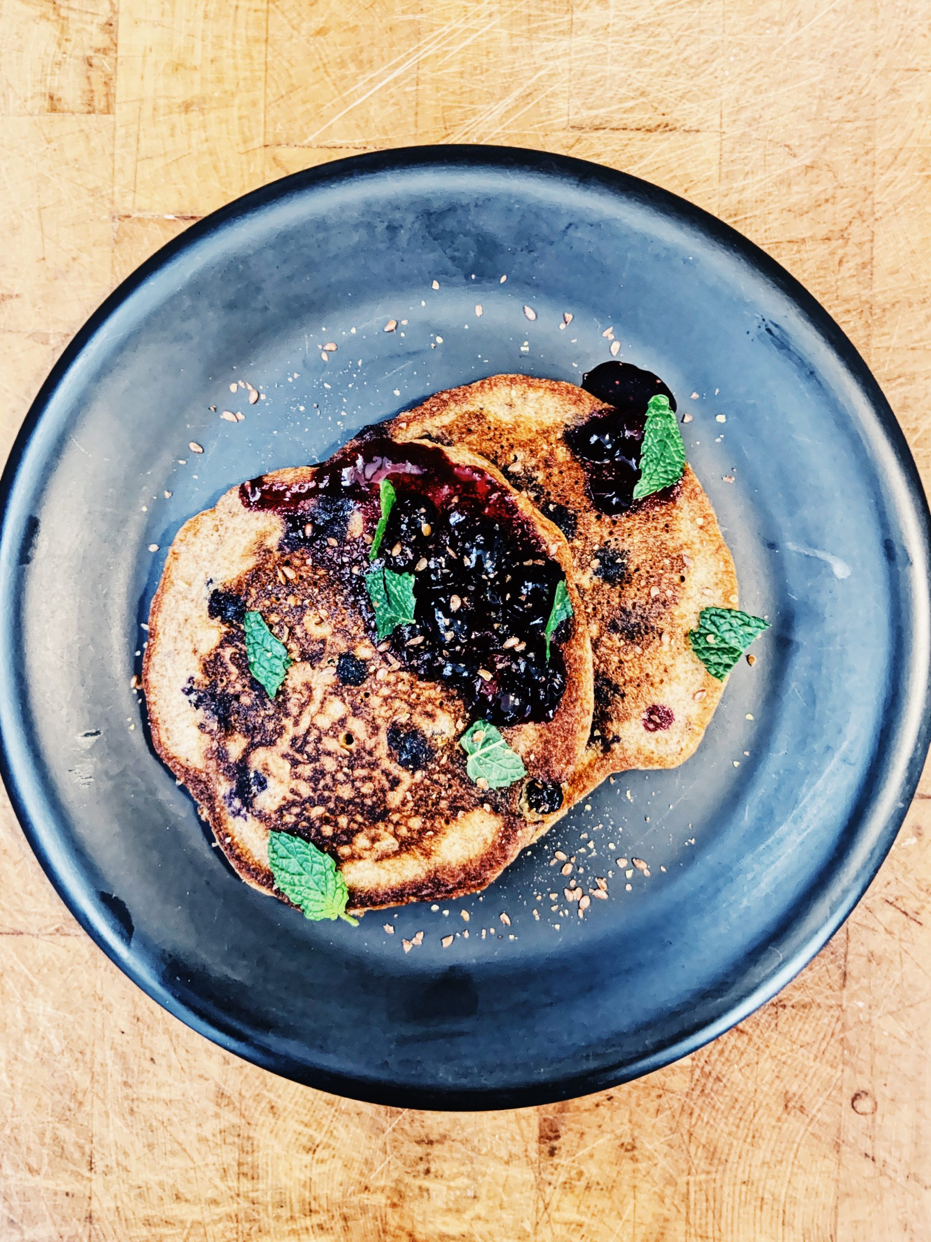 Overhead view of Sourdough Blueberry and Flax Pancakes. Recipe by Michael Joyce with Taproot Farm, PA.